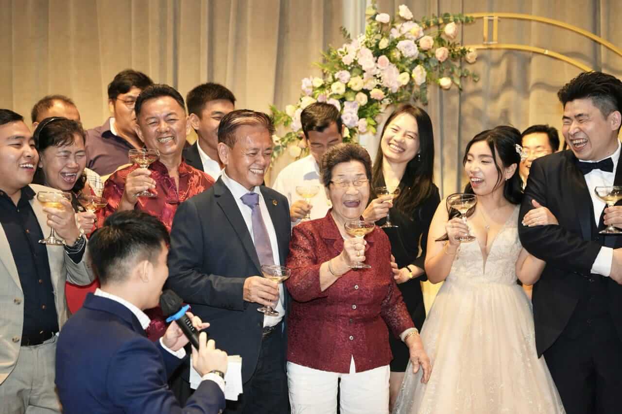 Emcee hosting a bilingual event in Singapore
